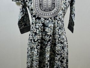 Black and white pattern designed with sequin embroidery on yoke with flare