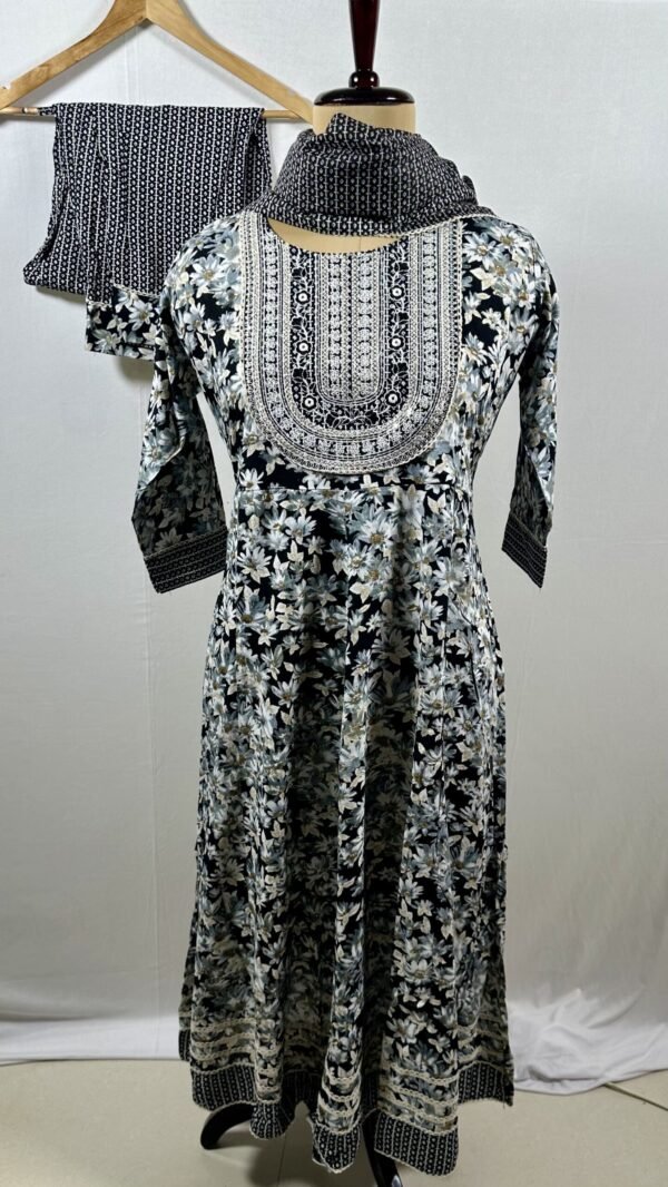 Black and white pattern designed with sequin embroidery on yoke with flare