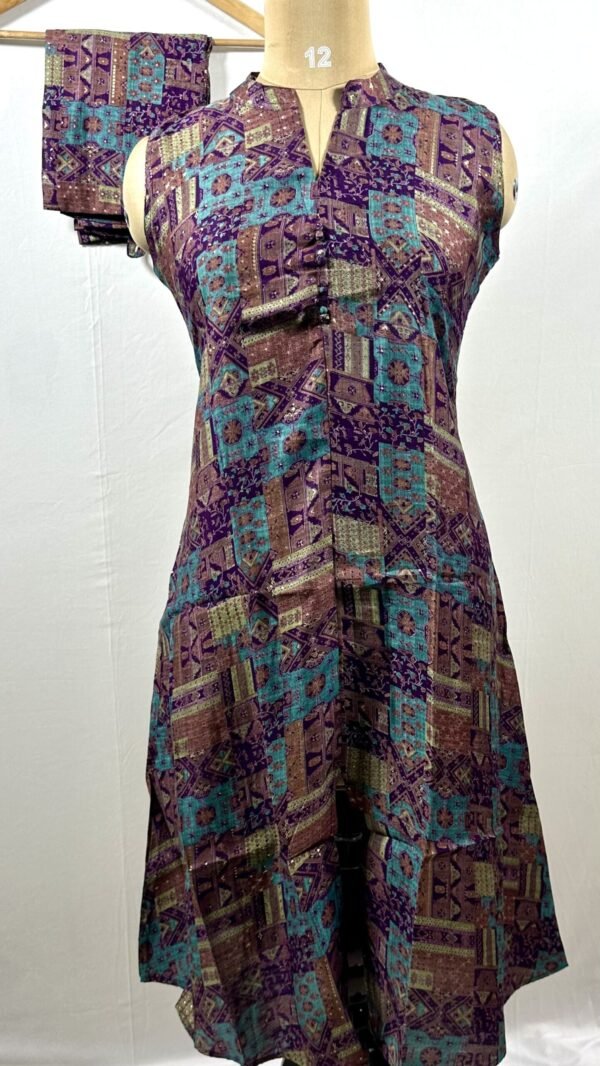 Coord set with shadess of purple teal and brown with accents of gold light green in intricate design